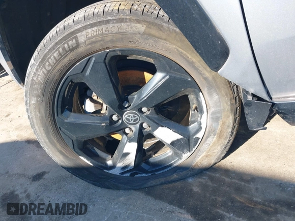 2021 Toyota RAV4 Hybrid XSE with VIN 4T3E6RFV7MU033736, listed as a IAAI auction lot 41640884 with 35,563 mi miles and . Bid and sale history available at DreamBid. Image 18.
