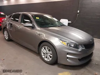 2018 Kia Optima LX with VIN 5XXGT4L32JG230478, listed as a IAAI auction lot 41846109 with 101,577 mi miles. Bid and sale history available at carsss.com. Image 1.