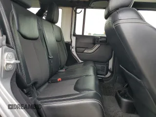 2016 Jeep Wrangler Unlimited Sport z VIN 1C4BJWDG5GL179046, wystawiony jako Copart lot #52989725 z przebiegiem 129 051 mil mil oraz Szkoda całkowita • Salvage title. Historia ofert i sprzedaży dostępna na DreamBid. Obrazek 10.