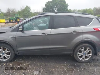 2013 Ford Escape SEL with VIN 1FMCU9HX4DUC75565, listed as a IAAI auction lot 42574351 with 180,876 mi miles and . Bid and sale history available at DreamBid. Image 15.