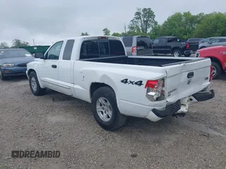 2005 Dodge Dakota SLT with VIN 1D7HW42N75S213191, listed as a IAAI auction lot 42345554 with 152,833 mi miles and . Bid and sale history available at DreamBid. Image 3.