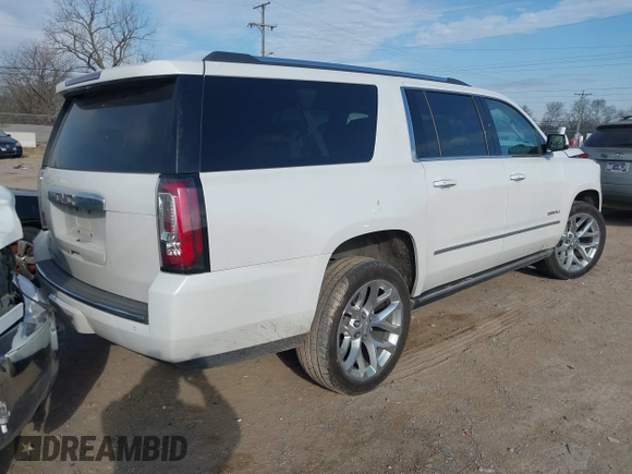 2020 GMC Yukon XL Denali with VIN 1GKS1HKJ6LR282854, listed as a IAAI auction lot 41717072 with 56,715 mi miles and . Bid and sale history available at DreamBid. Image 4.