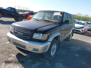 2000 Isuzu Trooper S with VIN JACDJ58X7Y7J06010, listed as a IAAI auction lot 42002763 with 165,285 mi miles and . Bid and sale history available at DreamBid. Image 2.