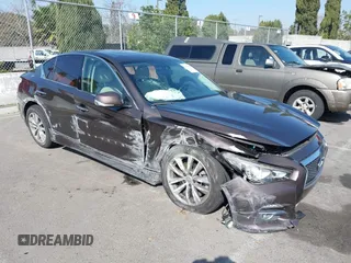 2014 Infiniti Q50 с VIN JN1BV7AP8EM670333, выставлен на аукционе IAAI как лот 41670015 с пробегом 59 427 миль миль и . История ставок и продаж доступна на DreamBid. Изображение 18.
