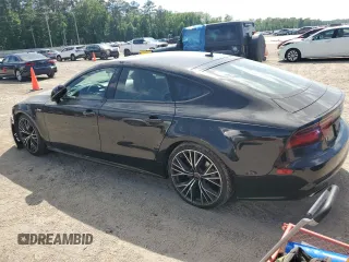 2016 Audi A7 3.0 Prestige with VIN WAU2GAFC8GN161766, listed as a Copart auction lot 51769055 with 135,005 mi miles and Salvage Title. Bid and sale history available at carsss.com. Image 2.