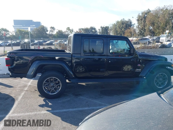 2020 Jeep Gladiator Overland with VIN 1C6HJTFG7LL139980, listed as a IAAI auction lot 40713794 with 33,560 mi miles and . Bid and sale history available at DreamBid. Image 14.