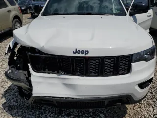 2019 Jeep Grand Cherokee Laredo E with VIN 1C4RJFAG8KC637464, listed as a Copart auction lot 60451115 with 102,105 mi miles and Salvage title. Bid and sale history available at DreamBid. Image 12.