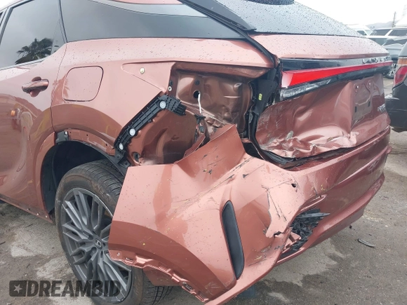 2023 Lexus RX 500h F Sport Performance with VIN 2T2BCMEA2PC001705, listed as a IAAI auction lot 41765718 with 32,391 mi miles and . Bid and sale history available at DreamBid. Image 6.