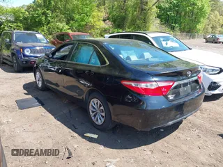 2015 Toyota Camry XLE z VIN 4T1BF1FK9FU985479, wystawiony jako IAAI lot #42220674 z przebiegiem 162 045 mil mil oraz . Historia ofert i sprzedaży dostępna na DreamBid. Obrazek 3.