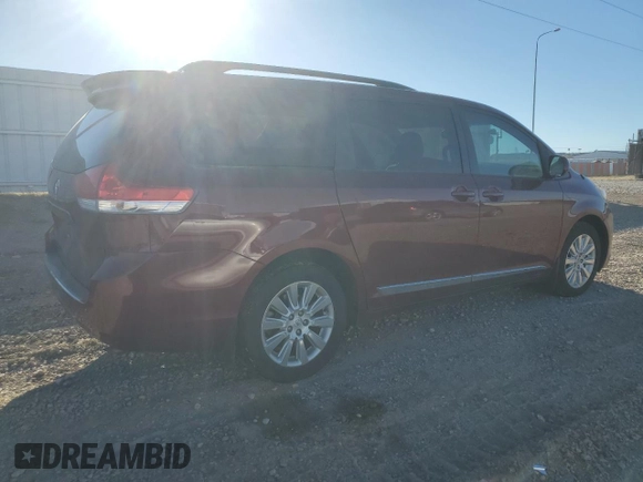 2014 Toyota Sienna LE with VIN 5TDJK3DC5ES075494, listed as a Copart auction lot 82048634 with 151,216 mi miles and Salvage Title. Bid and sale history available at DreamBid. Image 3.
