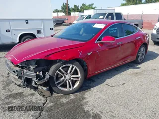 2014 Tesla Model S 60 z VIN 5YJSA1H16EFP42727, wystawiony jako IAAI lot #42544475 z przebiegiem 166 877 mil mil oraz . Historia ofert i sprzedaży dostępna na DreamBid. Obrazek 22.