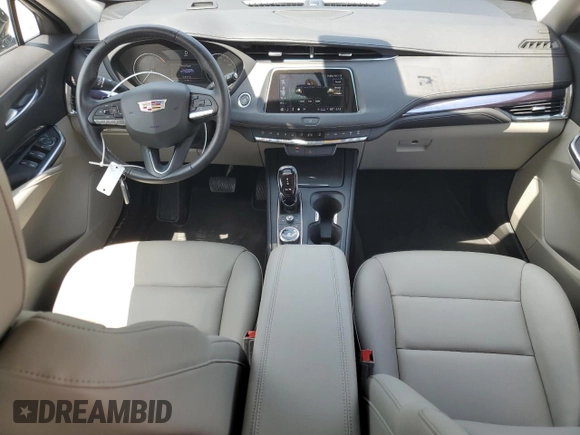 2023 Cadillac XT4 FWD Luxury с VIN 1GYAZAR47PF107473, выставлен на аукционе Copart как лот 59137665 с пробегом 9 198 миль миль и Списание • Salvage title. История ставок и продаж доступна на DreamBid. Изображение 8.