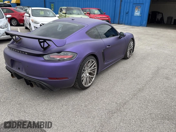 2018 Porsche 718 Cayman S z VIN WP0AB2A8XJK279655, wystawiony jako Copart lot #60089495 z przebiegiem 59 291 mil mil oraz Czysty tytuł • Clean title. Historia ofert i sprzedaży dostępna na DreamBid. Obrazek 4.