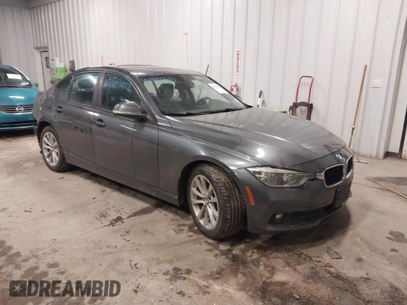 2018 BMW 3 Series 320i xDrive with VIN WBA8E5G50JNU48047, listed as a IAAI auction lot 41564022 with 69,971 mi miles. Bid and sale history available at carsss.com. Image 1.