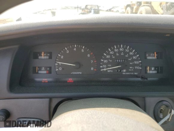 1993 Toyota T100 DX z VIN JT4VD10A5P0010588, wystawiony jako Copart lot #63862014 z przebiegiem 295 012 mil mil oraz Czysty tytuł • Clean title. Historia ofert i sprzedaży dostępna na DreamBid. Obrazek 9.
