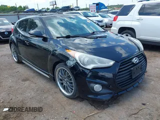 2013 Hyundai Veloster Turbo with VIN KMHTC6AE3DU111704, listed as a IAAI auction lot 42491273 with 114,501 mi miles and . Bid and sale history available at DreamBid. Image 1.