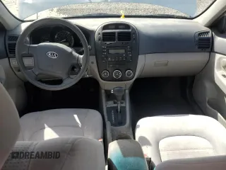2009 Kia Spectra LX z VIN KNAFE222295640665, wystawiony jako Copart lot #57086945 z przebiegiem 167 640 mil mil oraz Szkoda całkowita • Salvage title. Historia ofert i sprzedaży dostępna na DreamBid. Obrazek 8.