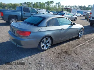 2007 BMW 3 Series 335i with VIN WBAWL73587PX49709, listed as a IAAI auction lot 41989465 with 147,255 mi miles. Bid and sale history available at carsss.com. Image 4.
