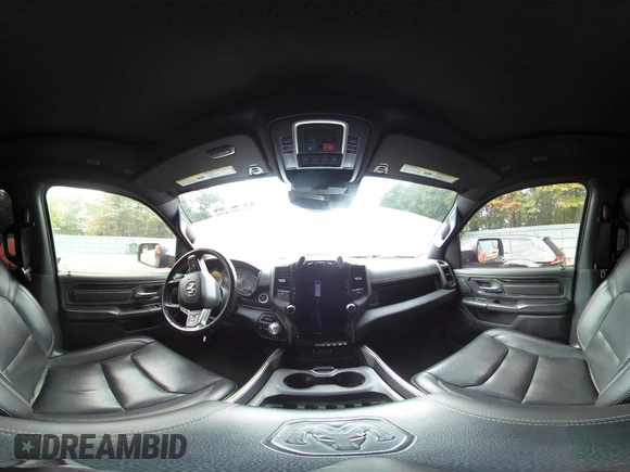 2021 Ram 1500 Rebel with VIN 1C6SRFLT2MN591844, listed as a IAAI auction lot 40410248 with 84,759 mi miles and . Bid and sale history available at DreamBid. Image 18.