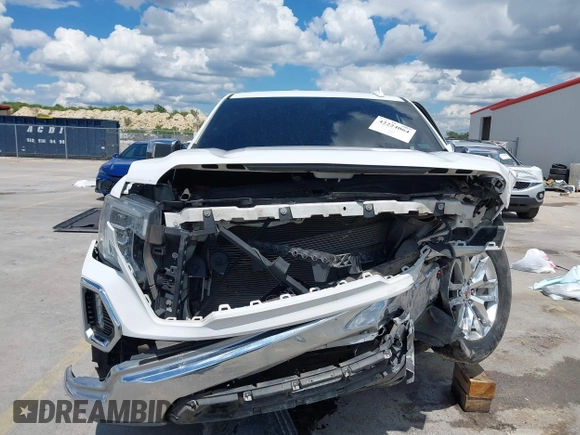 2019 GMC Sierra 1500 SLT z VIN 3GTP8DED7KG268973, wystawiony jako IAAI lot #42224064 z przebiegiem 98 871 mil mil oraz . Historia ofert i sprzedaży dostępna na DreamBid. Obrazek 13.