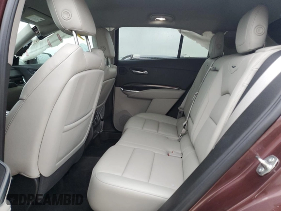 2023 Cadillac XT4 FWD Premium Luxury with VIN 1GYFZCR48PF100078, listed as a Copart auction lot 55955865 with 23,509 mi miles and Salvage title. Bid and sale history available at DreamBid. Image 11.