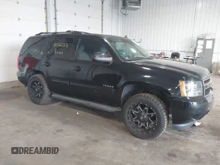 2014 Chevrolet Tahoe LT z VIN 1GNSCBE07ER249202, wystawiony jako IAAI lot #42546283 z przebiegiem 124 538 mil mil oraz . Historia ofert i sprzedaży dostępna na DreamBid. Obrazek 1.