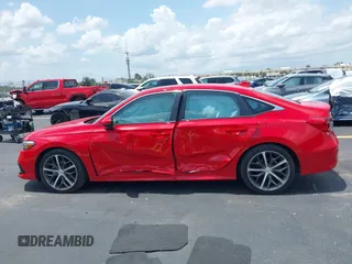 2023 Honda Civic Touring with VIN 2HGFE1F94PH323451, listed as a IAAI auction lot 42383422 with 6,120 mi miles and . Bid and sale history available at DreamBid. Image 14.