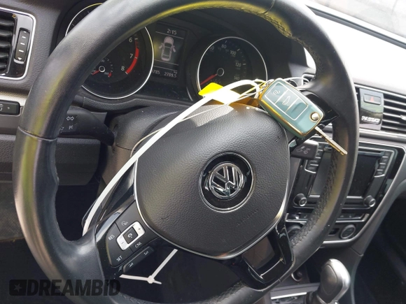 2018 Volkswagen Passat S z VIN 1VWAA7A35JC040106, wystawiony jako IAAI lot #41921626 z przebiegiem 60 785 mil mil oraz . Historia ofert i sprzedaży dostępna na DreamBid. Obrazek 11.