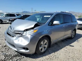 2015 Toyota Sienna LE AAS with VIN 5TDKK3DC2FS671233, listed as a Copart auction lot 57687265 with 141,526 mi miles and Salvage title. Bid and sale history available at DreamBid. Image 1.