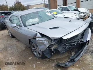 2017 Dodge Challenger SXT z VIN 2C3CDZAG0HH572554, wystawiony jako IAAI lot #41538875 z przebiegiem 186 381 mil mil oraz . Historia ofert i sprzedaży dostępna na DreamBid. Obrazek 1.