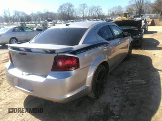 2014 Dodge Avenger SE with VIN 1C3CDZAG6EN181458, listed as a IAAI auction lot 41768889 with 181,416 mi miles and . Bid and sale history available at carsss.com. Image 4.