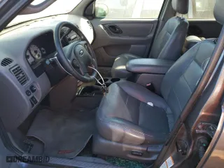 2002 Ford Escape Limited with VIN 1FMCU04122KD65674, listed as a Copart auction lot 56336504 with 199,739 mi miles and Salvage Title. Bid and sale history available at carsss.com. Image 7.