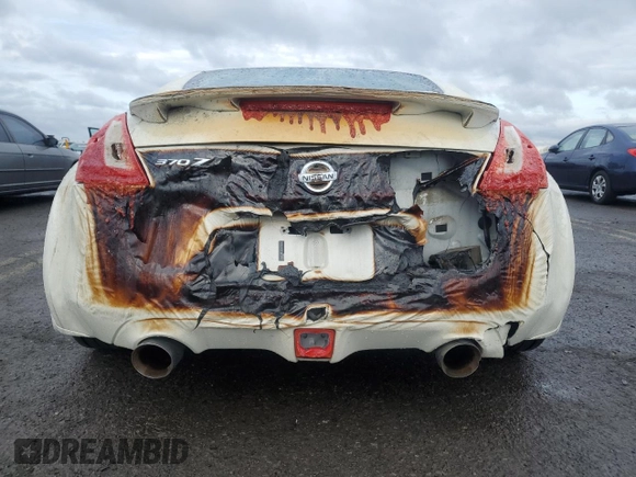 2015 Nissan 370Z with VIN JN1AZ4EH2FM440869, listed as a Copart auction lot 49371185 with 0 mi miles and Salvage Title. Bid and sale history available at carsss.com. Image 6.