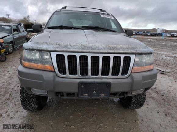 1999 Jeep Grand Cherokee Laredo with VIN 1J4GW58SXXC553547, listed as a Copart auction lot 50786405 with 151,968 mi miles and Salvage Title. Bid and sale history available at carsss.com. Image 5.