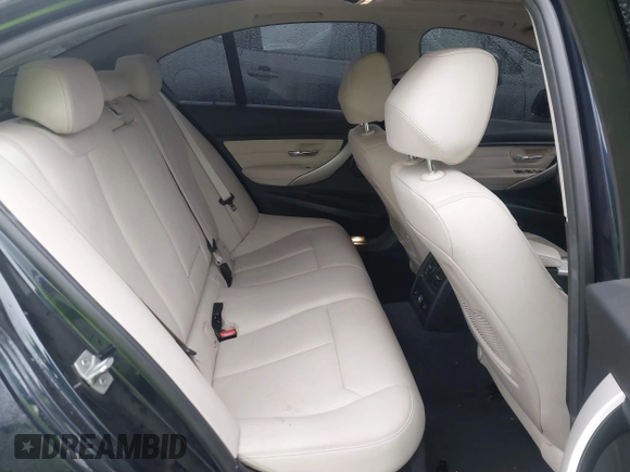 2015 BMW 3 Series 320i xDrive with VIN WBA3C3C57FP664631, listed as a IAAI auction lot 41117730 with 102,555 mi miles and . Bid and sale history available at DreamBid. Image 8.