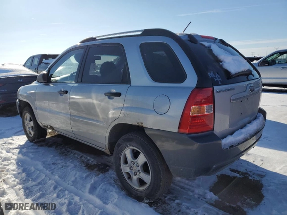 2007 Kia Sportage LX with VIN KNDJF724677426143, listed as a Copart auction lot 45154645 with 211,441 mi miles and Salvage Title. Bid and sale history available at carsss.com. Image 2.