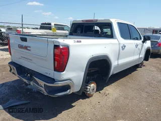2021 GMC Sierra 1500 SLT z VIN 3GTU9DED2MG439731, wystawiony jako IAAI lot #42014277 z przebiegiem Nie podano mil oraz . Historia ofert i sprzedaży dostępna na DreamBid. Obrazek 4.