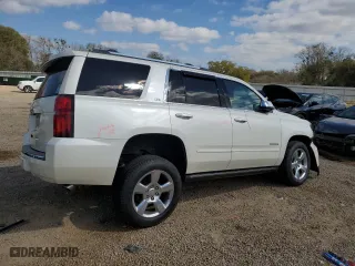 2015 Chevrolet Tahoe LTZ with VIN 1GNSCCKCXFR102314, listed as a Copart auction lot 48479825 with 218,901 mi miles and Salvage Title. Bid and sale history available at carsss.com. Image 3.