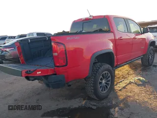 2018 Chevrolet Colorado 4WD ZR2 with VIN 1GCGTEEN7J1155034, listed as a IAAI auction lot 41157795 with 54,005 mi miles. Bid and sale history available at carsss.com. Image 4.