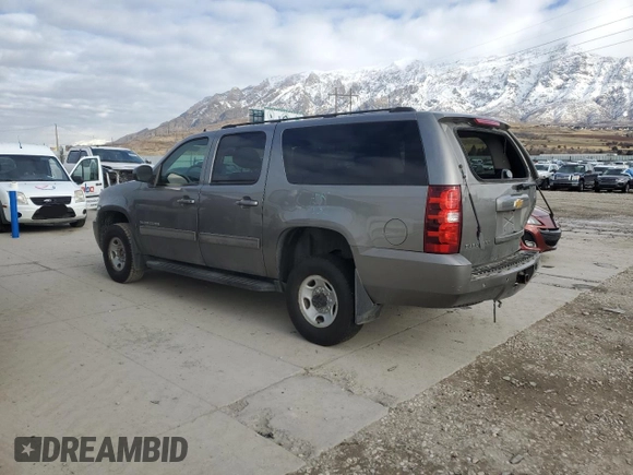 2012 Chevrolet Suburban LS with VIN 1GNWKLEG3CR308413, listed as a Copart auction lot 83671324 with 141,053 mi miles and Salvage title. Bid and sale history available at DreamBid. Image 2.