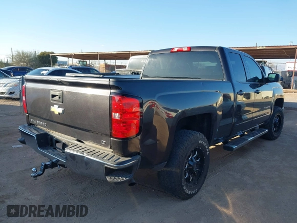 2015 Chevrolet Silverado 1500 LT with VIN 1GCRCREC1FZ308563, listed as a IAAI auction lot 41455858 with 162,196 mi miles. Bid and sale history available at carsss.com. Image 4.