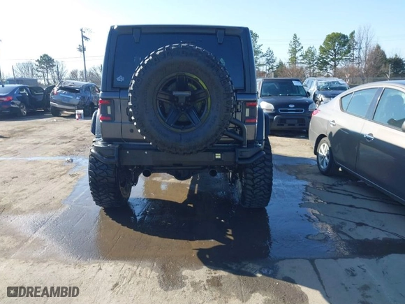 2019 Jeep Wrangler Unlimited Sport S with VIN 1C4HJXDG2KW612913, listed as a IAAI auction lot 41519311 with 104,583 mi miles. Bid and sale history available at carsss.com. Image 17.