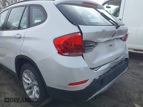 2015 BMW X1 xDrive28i with VIN WBAVL1C59FVY40443, listed as a IAAI auction lot 41777176 with 91,560 mi miles. Bid and sale history available at carsss.com. Image 16.