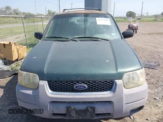 2001 Ford Escape XLT with VIN 1FMYU04101KE97210, listed as a IAAI auction lot 42277209 with 173,335 mi miles and . Bid and sale history available at DreamBid. Image 6.