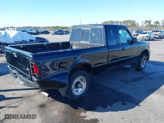 1999 Ford Ranger XL with VIN 1FTYR14X6XTA83979, listed as a IAAI auction lot 41355593 with 201,284 mi miles. Bid and sale history available at carsss.com. Image 4.