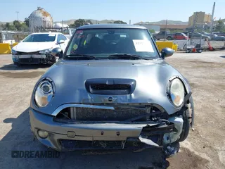 2007 MINI Hardtop S with VIN WMWMF73597TL86892, listed as a IAAI auction lot 42157544 with 93,097 mi miles and . Bid and sale history available at DreamBid. Image 13.