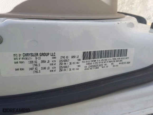 2014 Dodge Grand Caravan SE with VIN 2C4RDGBG6ER130232, listed as a IAAI auction lot 41818000 with 168,807 mi miles. Bid and sale history available at carsss.com. Image 9.