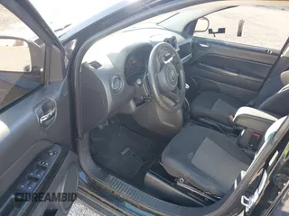 2015 Jeep Compass Sport with VIN 1C4NJCBB0FD110728, listed as a IAAI auction lot 41405949 with 170,614 mi miles. Bid and sale history available at carsss.com. Image 16.