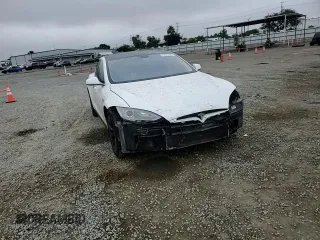 2014 Tesla Model S 60 с VIN 5YJSA1H19EFP52457, выставлен на аукционе Copart как лот 59589905 с пробегом 167 662 миль миль и Списание • Salvage title. История ставок и продаж доступна на DreamBid. Изображение 14.