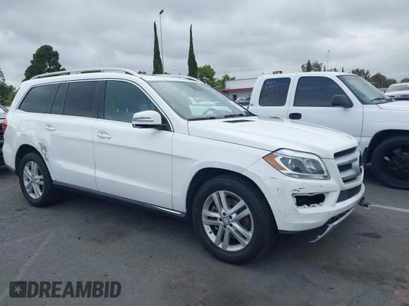 2014 Mercedes-Benz GL 450 z VIN 4JGDF7CE0EA424081, wystawiony jako IAAI lot #42359465 z przebiegiem 145 363 mil mil oraz . Historia ofert i sprzedaży dostępna na DreamBid. Obrazek 1.